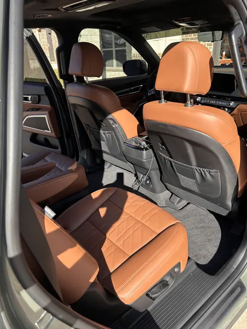 Clean tan leather seating after interior detailing